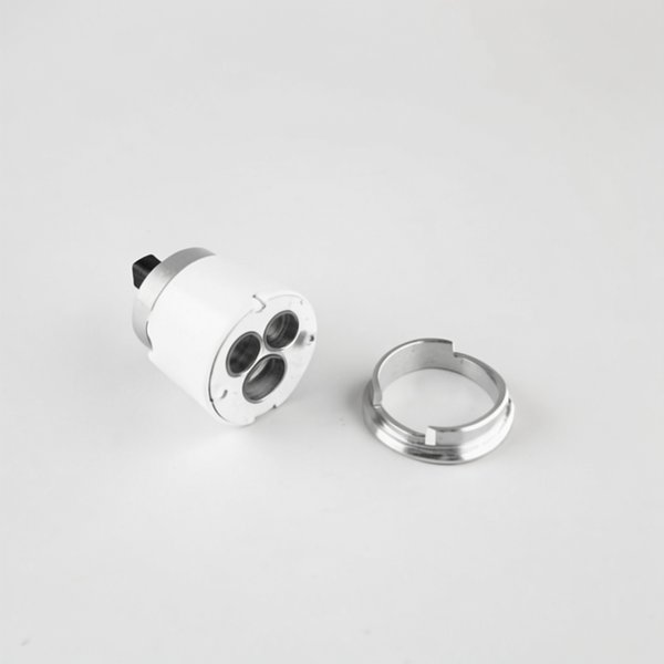 Ecrou et cartouche monocommande pour douche